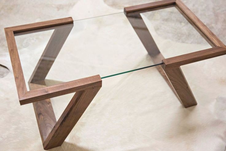 Glass table with wooden frame